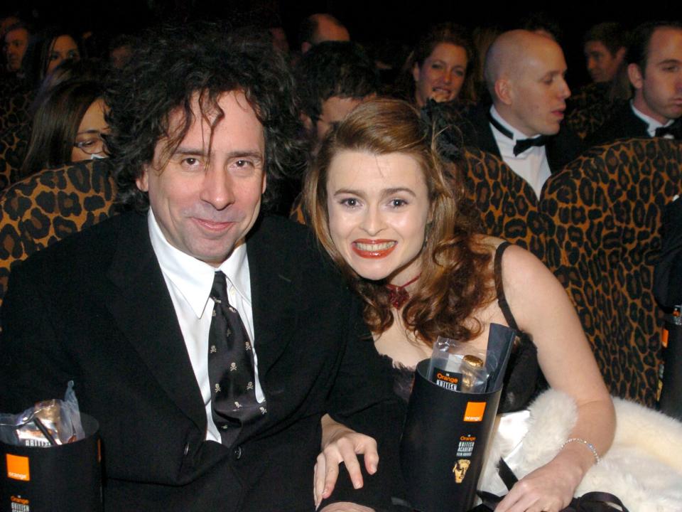 Tim Burton and Helena Bonham Carter during 2004 BAFTA Awards - Backstage and Audience at The Odeon Leicester Square in London, United Kingdom