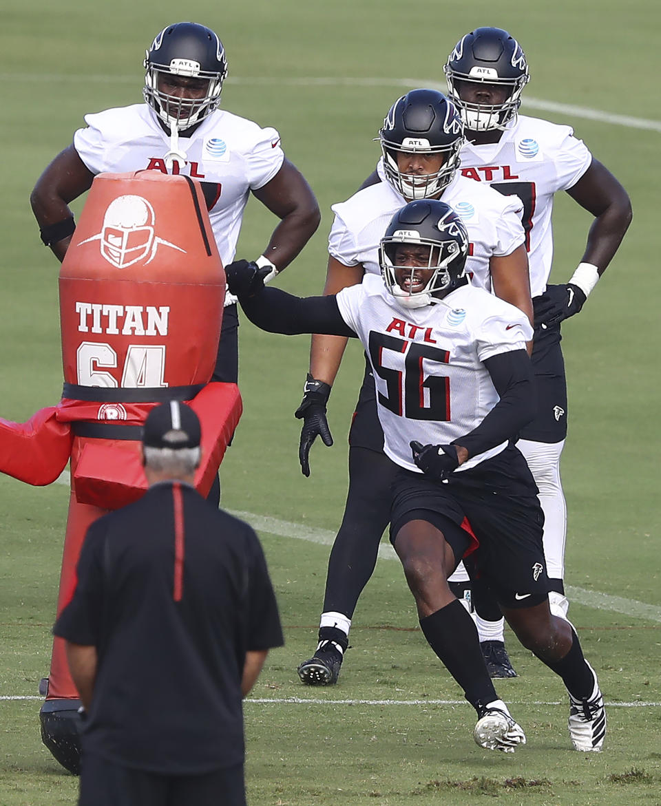 Atlanta Falcons defensive end Dante Fowler (56) runs a drill during NFL football training camp on Wednesday, Aug. 19, 2020, in Flowery Branch, Ga. (Curtis Compton/Atlanta Journal-Constitution via AP, Pool)