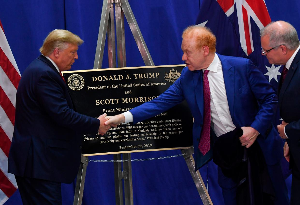 Donald Trump shakes hand with Australian billionaire Anthony Pratt.