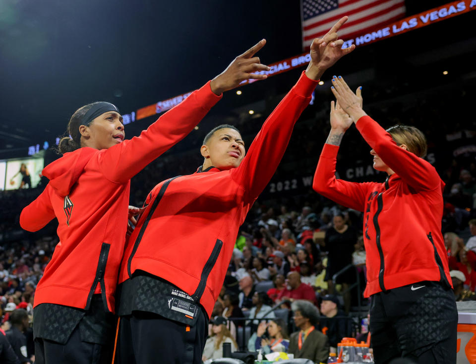 Sydney Colson (L), Kierstan Bell (C) and Cayla George (R) of the Las Vegas Aces react on the bench during Game 2 of the 2023 WNBA Finals. Each will need to play a bigger role with two starters out for Game 4. (Photo by Ethan Miller/Getty Images)