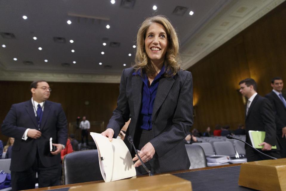 Sylvia Mathews Burwell, President Barack Obama’s nominee to become secretary of Health and Human Services, arrives at the Senate Health, Education, Labor and Pensions Committee for her confirmation hearing, on Capitol Hill in Washington, Thursday, May 8, 2014. Burwell has found favor with both Republicans and Democrats in her current role as the head of the Office of Management and Budget and would replace Kathleen Sebelius, who resigned as HHS chief last month after presiding over the Affordable Care Act and its problematic rollout. (AP Photo/J. Scott Applewhite)