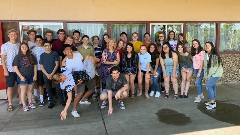 Students rally behind teacher Anne Tweedy, who claims she is being forced to transfer after building materials in Bella Vista High School's new science building made her ill. (Photo: Change.org)