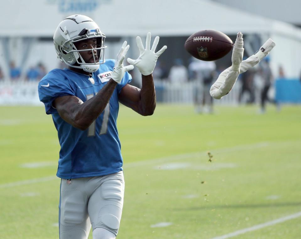 Detroit Lions wide receiver Denzel Mims (17) catches a pass during training camp at team headquarters in Allen Park on Friday, July 28, 2023.