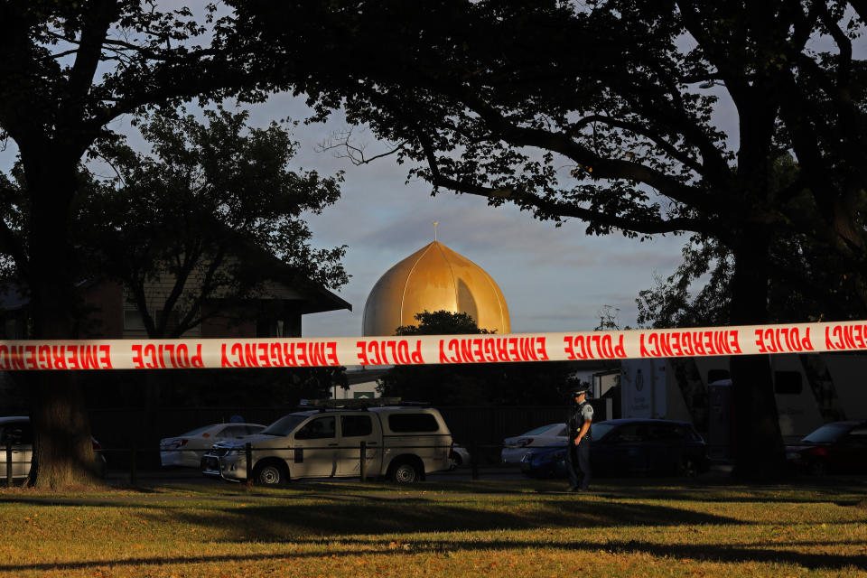 A police officer stands guard in front of the Masjid Al Noor mosque in Christchurch, New Zealand, Sunday, March 17, 2019, where one of two mass shootings occurred. (Photo: Vincent Yu/AP)