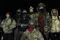 Veterans have a demonstration on Backwater bridge during a protest against plans to pass the Dakota Access pipeline near the Standing Rock Indian Reservation, near Cannon Ball, North Dakota, U.S., December 1, 2016. REUTERS/Stephanie Keith