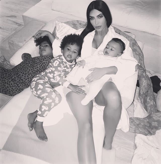 16) Kim, North, Saint and Chi, May 2018