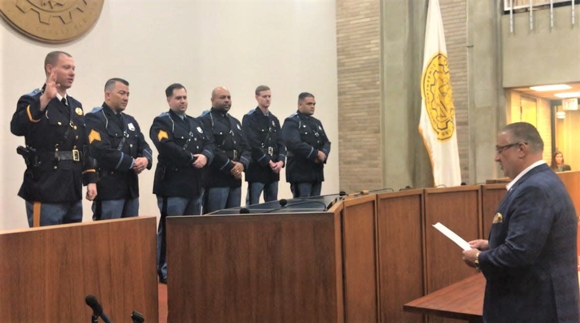 Vineland Mayor Anthony Fanucci officiates at a police promotions ceremony Monday. L-R, at their new ranks, are Capt. Brian Armstrong; Lt. Danny Latorre and Lt. Ryan Watkins; and Sgt. Nelson Gonzalez, Sgt. Michael Dennis, and Sgt. Fred DeMary Jr. PHOTO: April 8, 2024.