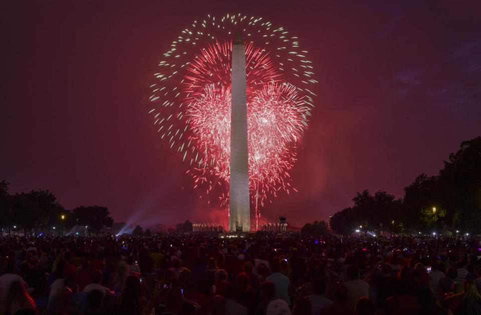 Explosions light up the Washington Monument during a&nbsp;fireworks display on the National Mall&nbsp;on Tuesday.