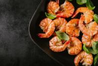 <p><strong>Quantity:</strong> 4 jumbo shrimp, 6 large shrimp, or 7 medium shrimp </p><p><strong>Per serving:</strong> 85 calories, 20 g protein, 0 g carbs, 0.5 g fat</p><p><strong>READ MORE</strong>: <a href="https://www.womansday.com/food-recipes/food-drinks/g28357223/seafood-recipes/" rel="nofollow noopener" target="_blank" data-ylk="slk:35 Delicious Seafood Recipes to Cook Right Now;elm:context_link;itc:0;sec:content-canvas" class="link ">35 Delicious Seafood Recipes to Cook Right Now</a></p>