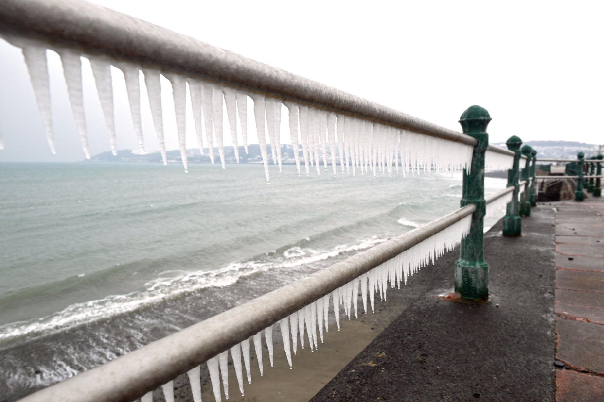 Icicles form on seafront railings at Penzance in Cornwall, pictured last March. (PA)