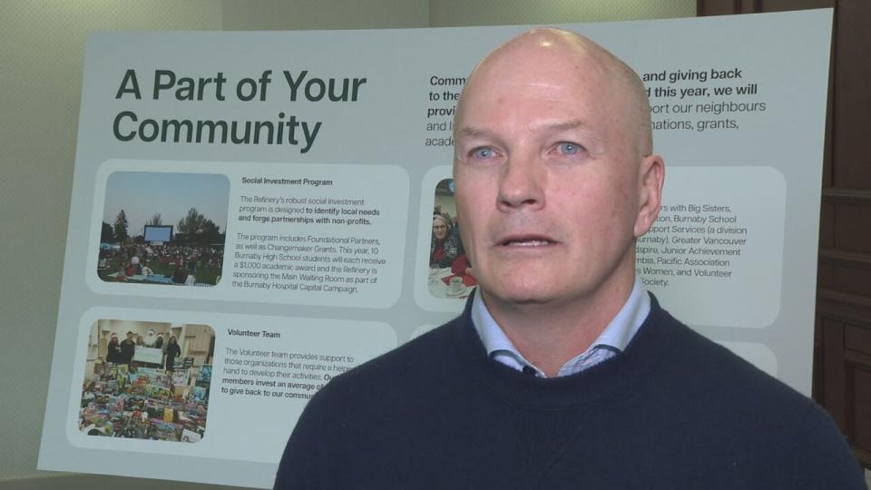 Alex Coles, Parkland Corporation's Burnaby refinery plant manager speaks at a community information session in the city on Tuesday, Feb. 20, 2024. 