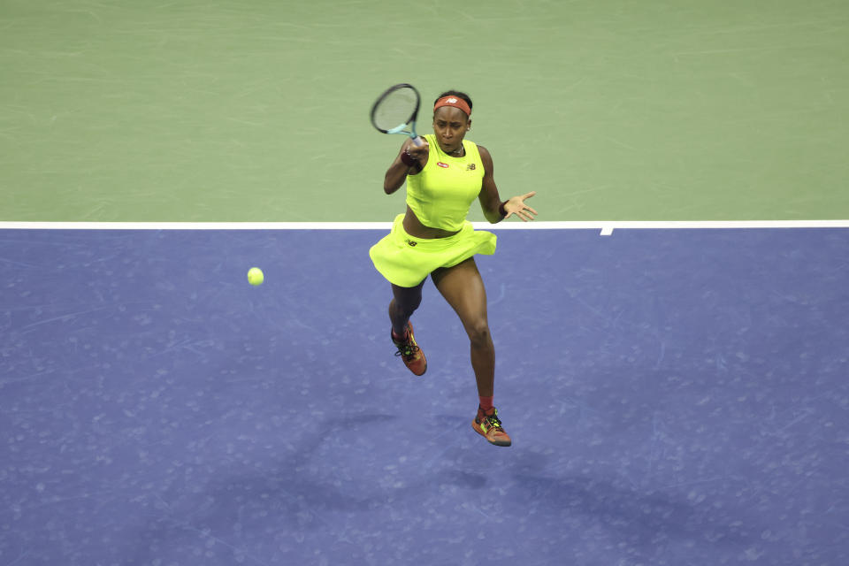 Coco Gauff, of the United States, returns a shot to Laura Siegemund, of Germany, during the first round of the U.S. Open tennis championships, Monday, Aug. 28, 2023, in New York. (AP Photo/Jason DeCrow)