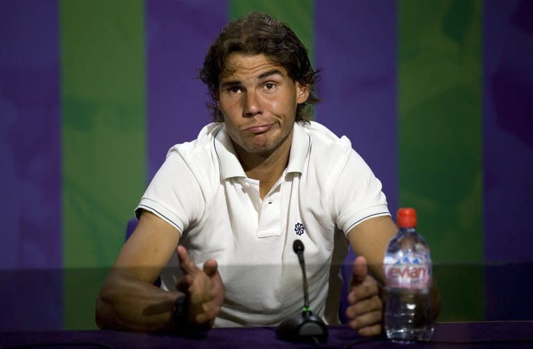 This file photo shows Rafael Nadal speaking during a press conference after his 2nd round defeat by Czech Republic's Lukas Rosol at the Wimbledon Championships tennis tournament, southwest London, on June 28, 2012. Nadal heads into 2013 with his career in freefall and needing to summon up the no-surrender spirit that steered him to 11 Grand Slam titles