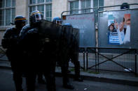 French CRS riot police face off with demonstrators after the announcement of results in the election of Emmanuel Macron as French President, in Paris, France, May 7, 2017. REUTERS/Stephane Mahe