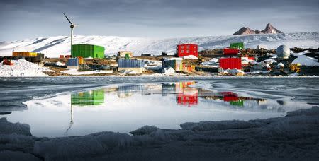 A view shows Antarctica's Mawson station looking across Horseshoe Harbour from East Arm, with the peaks of Mt Henderson behind, in this undated photo supplied to Reuters February 24, 2016 by the Australian Antarctic Division. REUTERS/Chris Wilson-Australian Antarctic Division/Handout via Reuters