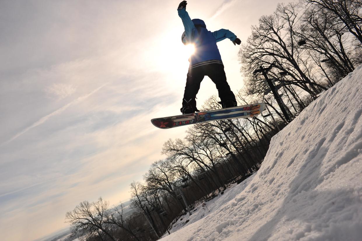 Kids 12 and under ski and snowboard for free with a paying adult at Cascade Mountain in Portage.