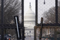 Security surrounds the U.S. Capitol in Washington, Friday, Jan. 15, 2021, ahead of the inauguration of President-elect Joe Biden and Vice President-elect Kamala Harris. (AP Photo/Susan Walsh)