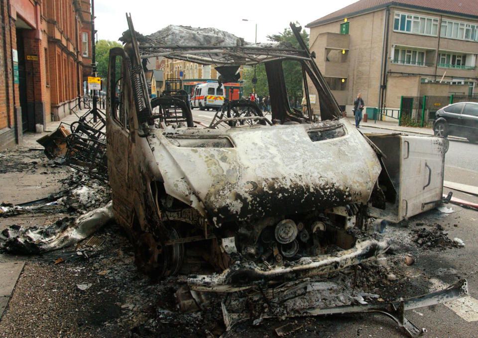 Other vehicles were also targeted in the attack- this van totalled by an intense blaze.