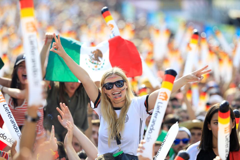 BERLIN, GERMANY - JUNE 17: Fans gather for a public viewing event at historical Brandenburg Gate in Berlin, German on June 17, 2018, before the start of 2018 FIFA World Cup Russia Group F match between Germany and Mexico. (Photo by Abdulhamid Hosbas/Anadolu Agency/Getty Images)