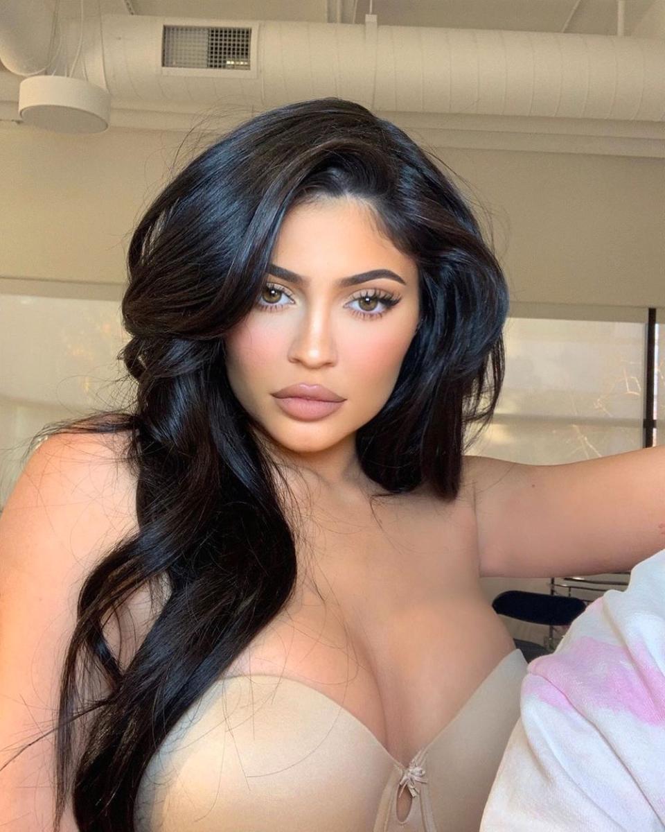 Kylie Jenner poses in a flesh bra