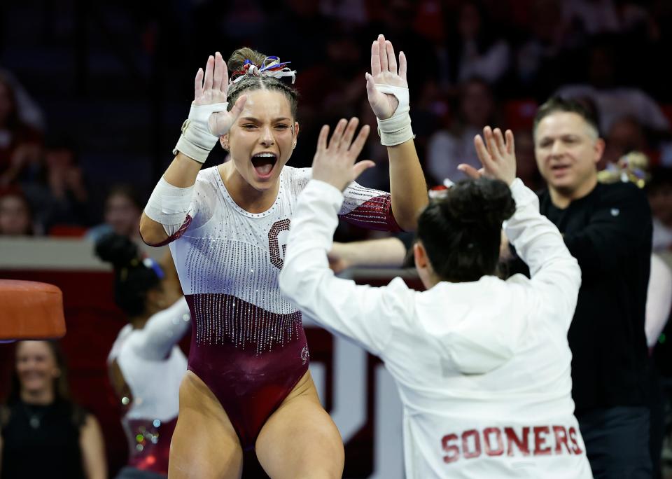 OU's Jordan Bowers celebrates after competing in the vault against Utah at the Lloyd Noble Center in Norman on Jan. 22.