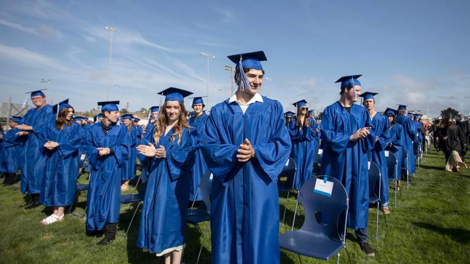 At Morro Bay High School, 180 grads were honored Thursday evening in a ceremony at the school’s football field. Morro Bay students cheer at the beginning of the ceremony.