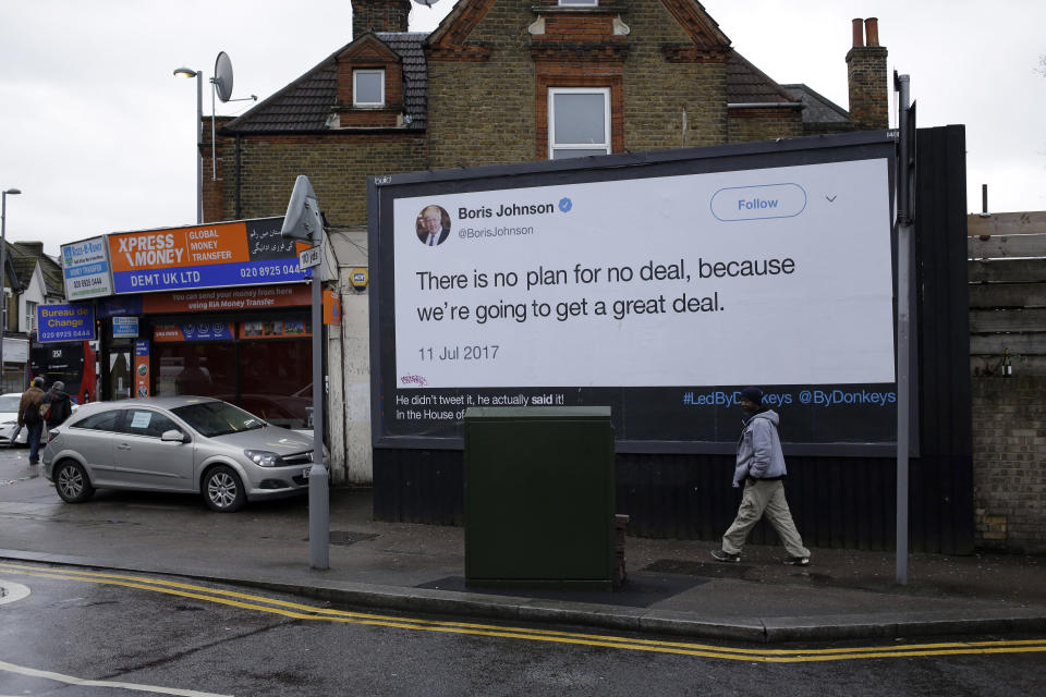 ADVANCE FOR PUBLICATION ON SUNDAY, FEB. 17, AND THEREAFTER - A billboard is displayed as part of the campaign for Britain to remain in the European Union, by the "Led By Donkeys" group, which aims to highlight quotes on Brexit made by politicians and organizations and displayed on billboards in London, in this photo dated Friday, Feb. 8, 2019. The British and Irish leaders were meeting Friday to discuss the Irish border, and mend fences, amid rising tensions between Britain and the European Union over Brexit. Four friends have recently started posting quotes and Tweets by pro-Brexit politicians to highlight what the group see as their hypocrisy, dubbing their billboard campaign “Led by Donkeys,”.(AP Photo/Matt Dunham)