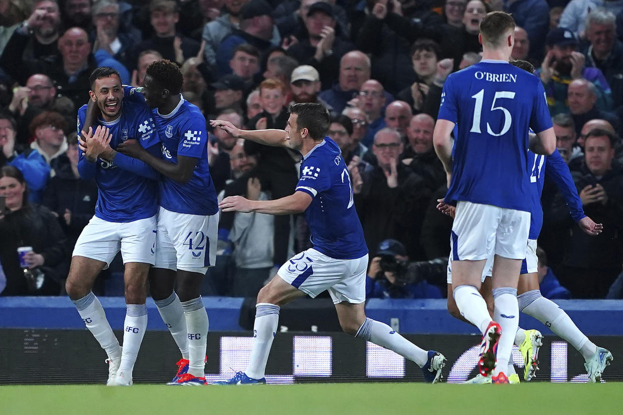 Everton's Tim Iroegbunam (second left) celebrates scoring their side's first goal of the game with team-mates during an English League Cup second round match between Everton and Doncaster Rovers at Goodison Park in Liverpool, England, Tuesday, Aug. 27, 2024. (Peter Byrne/PA via AP)