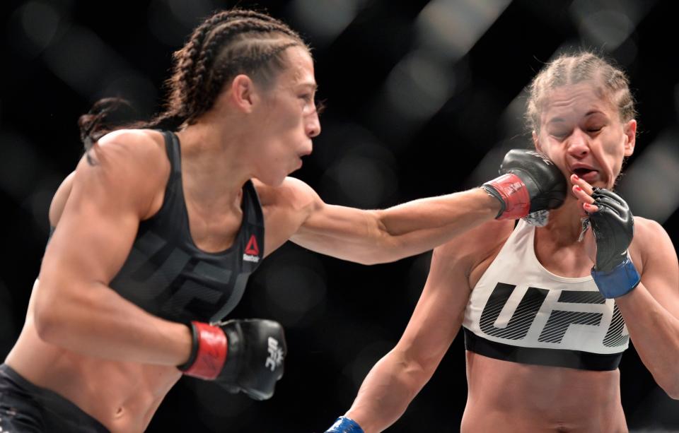 <p>(L-R) Joanna Jedrzejczyk of Poland punches Karolina Kowalkiewicz of Poland in their UFC women’s strawweight championship fight during the UFC 205 event at Madison Square Garden on November 12, 2016 in New York City. (Photo by Brandon Magnus/Zuffa LLC/Zuffa LLC via Getty Images) </p>