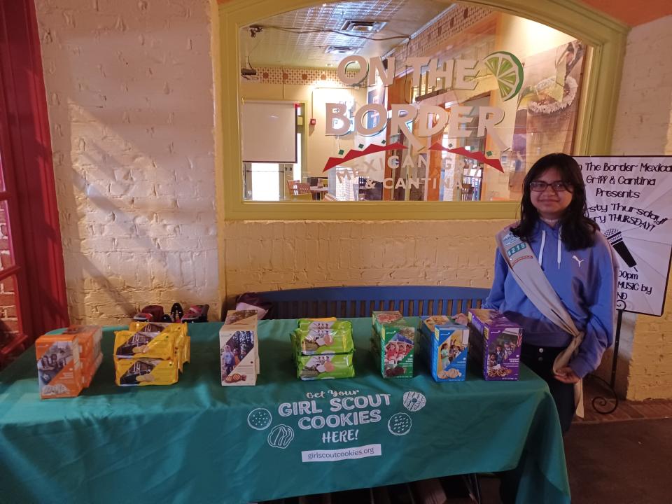 Girl Scout Bri'ele Torrez of Lubbock Troop 6215 selling cookies at On The Boarder on Feb. 26, 2023. Torrez sold over 900 boxes of cookies in 2023.