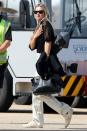 <p>Kate Moss shows off her travel style at London’s Luton Private Airport on Thursday.</p>