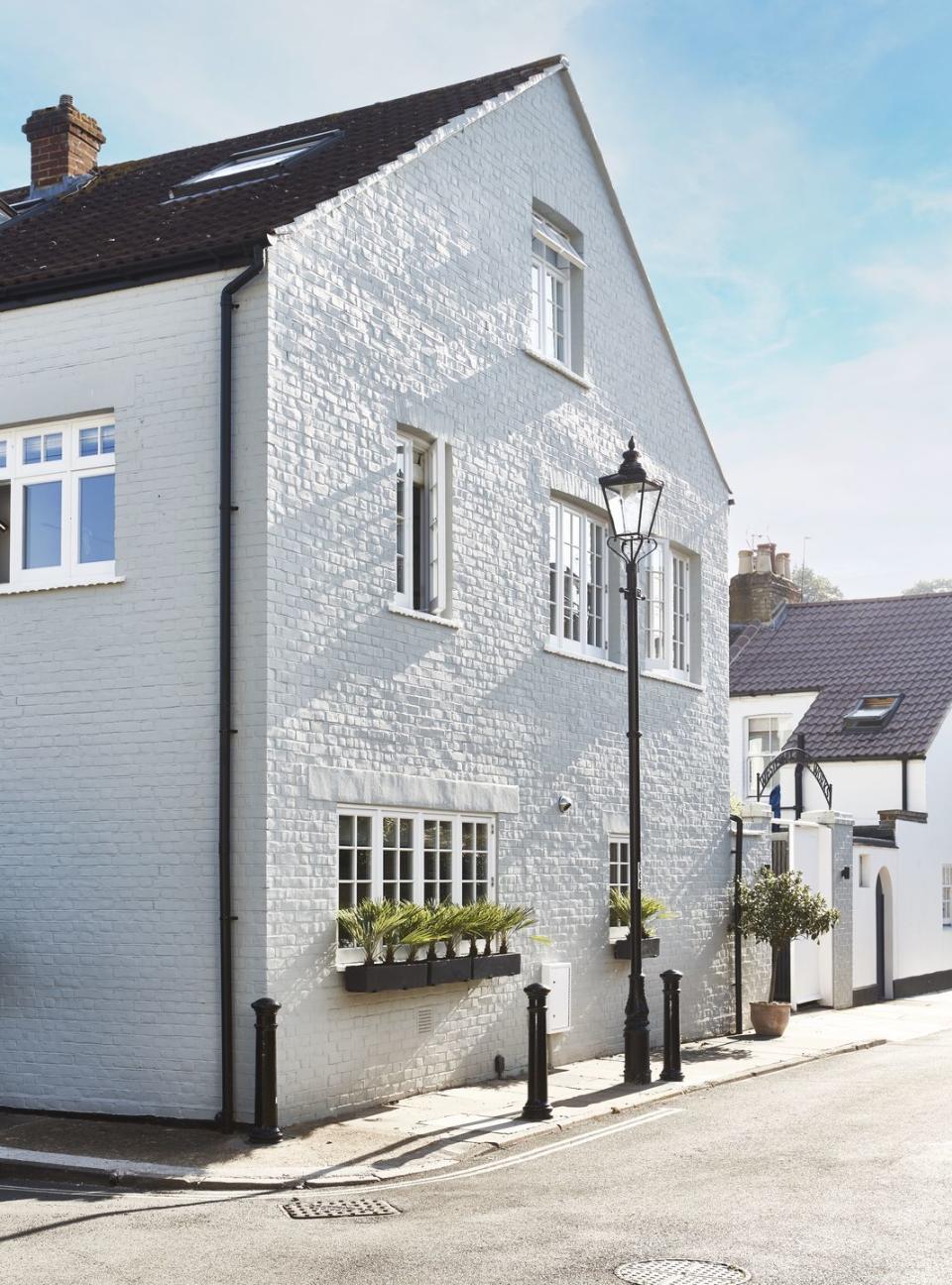 white brick exterior street view