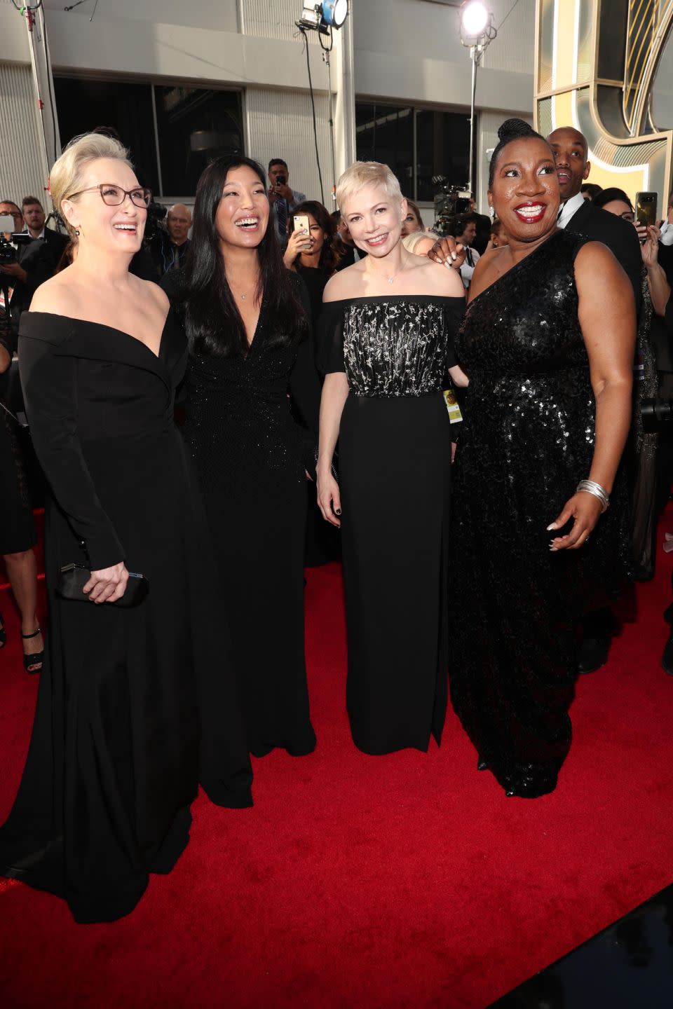 Actresses Meryl Streep and Michelle Williams with activists Ai-jen Poo and Tarana Burke. Photo: Getty
