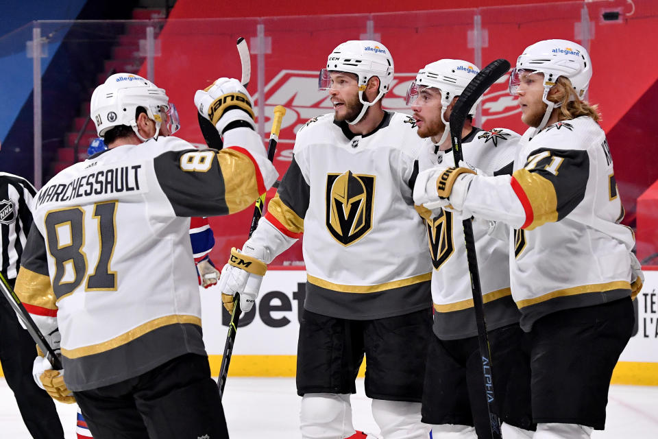 MONTREAL, QUEBEC - JUNE 24: Reilly Smith #19 of the Vegas Golden Knights celebrates with his teammates after scoring a goal against Carey Price #31 of the Montreal Canadiens during the first period in Game Six of the Stanley Cup Semifinals of the 2021 Stanley Cup Playoffs at Bell Centre on June 24, 2021 in Montreal, Quebec. (Photo by Minas Panagiotakis/Getty Images)