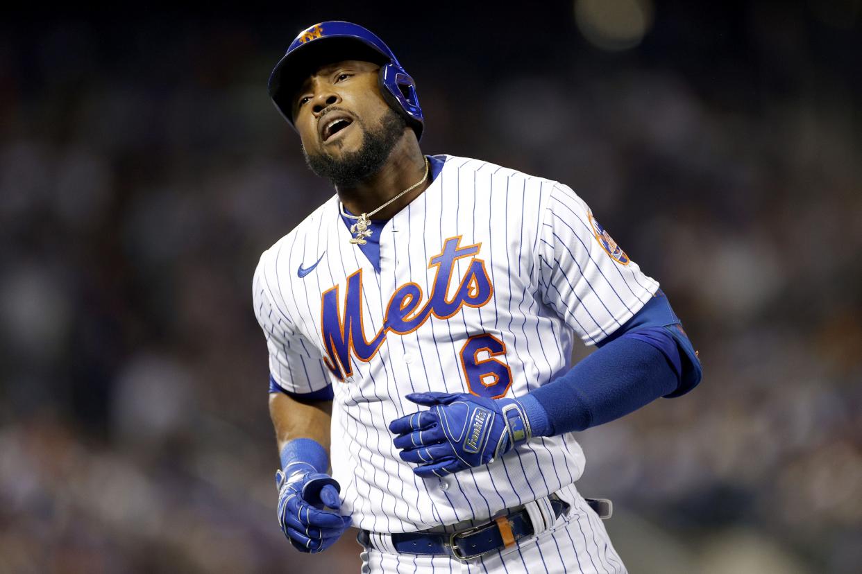 Starling Marte #6 of the New York Mets reacts after an out against the San Diego Padres during the fourth inning in game three of the National League Wild Card Series at Citi Field on October 09, 2022 in the Flushing neighborhood of the Queens borough of New York City.