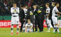 Football Soccer - Borussia Monchengladbach v Eintracht Frankfurt - DFB Pokal Semi Final - Borussia-Park, Monchengladbach, Germany - 25/4/17 Borussia Monchengladbach's Nico Schulz and teammates look dejected after losing the match with a penalty shootout Reuters / Wolfgang Rattay Livepic