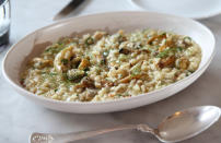 <p>Plenty of risotto recipes include a glass or two of wine. I read somewhere that it helps dissolve alcohol soluble flavour compounds and release them into the dish so, hey, you could end up with a tastier risotto. Try <a rel="nofollow noopener" href="http://www.jamieoliver.com/recipes/rice-recipes/a-basic-risotto-recipe/" target="_blank" data-ylk="slk:this recipe from Jamie Oliver;elm:context_link;itc:0;sec:content-canvas" class="link ">this recipe from Jamie Oliver</a>. [Photo: Getty} </p>