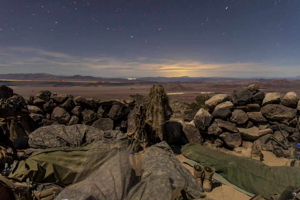 U.S. Army Special Forces Green Berets, assigned to 7th Special Forces Group (Airborne), Operational Detachment-A, sleep inside a hide site during a special reconnaissance mission while participating in Integrated Training Exercise 2-16 at Marine Corps Air Ground Combat Center, Twentynine Palms, California, Feb. 16, 2016.&nbsp;