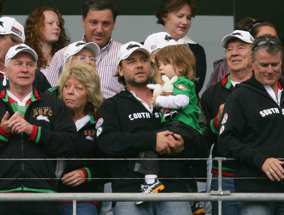 Rabbitohs part owner Russell Crowe celebrates with his son Charlie after the Rabbitohs victory over the Eels during the round two NRL match between the South Sydney Rabbitohs and the   Parramatta Eels at Telstra Stadium on March 25, 2007 in Sydney, Australia.  (Photo by Matt Blyth/Getty Images)