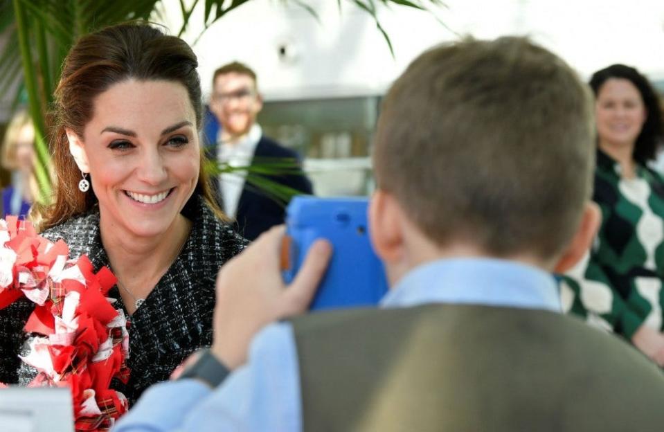 The Duchess of Cambridge visited a children's hospital, where she worked with kids on art.