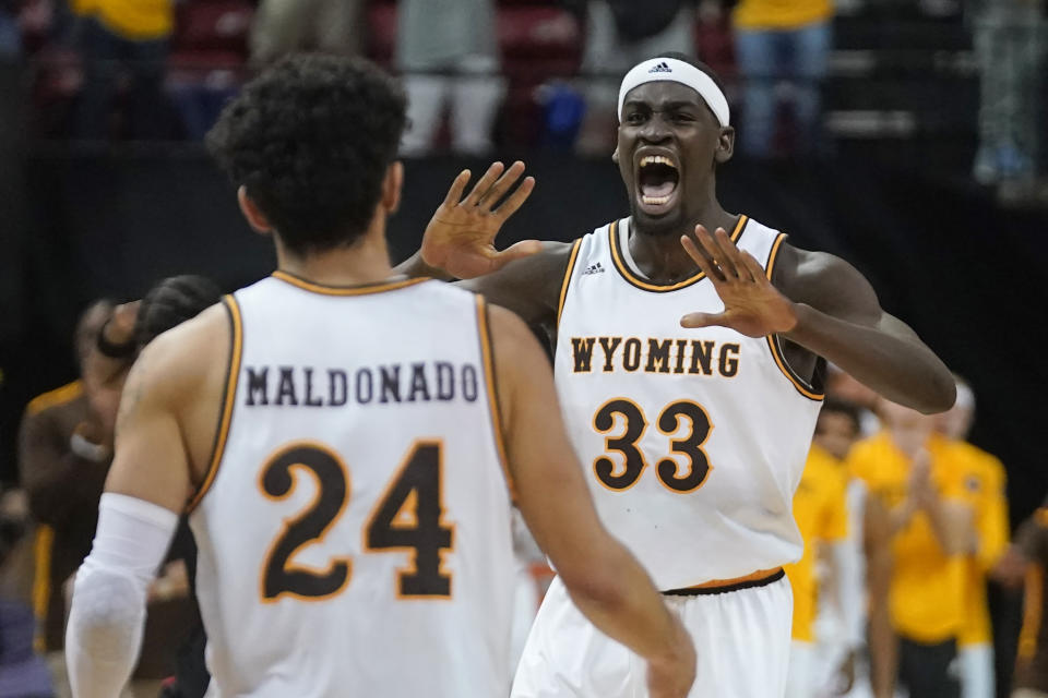 FILE - Wyoming's Graham Ike (33) reacts during the second half of the team's NCAA college basketball game against UNLV in the quarterfinals of Mountain West Conference men's tournament Thursday, March 10, 2022, in Las Vegas. The Cowboys are back in the NCAA tournament for the first time since 2015 when they won their conference tournament. (AP Photo/Rick Bowmer, File)