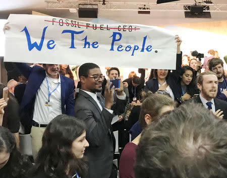 Protesters interrupt a U.S. government pro-coal event during the COP23 UN Climate Change Conference 2017, hosted by Fiji but held in Bonn, Germany, November 13, 2017. REUTERS/Alister Doyle