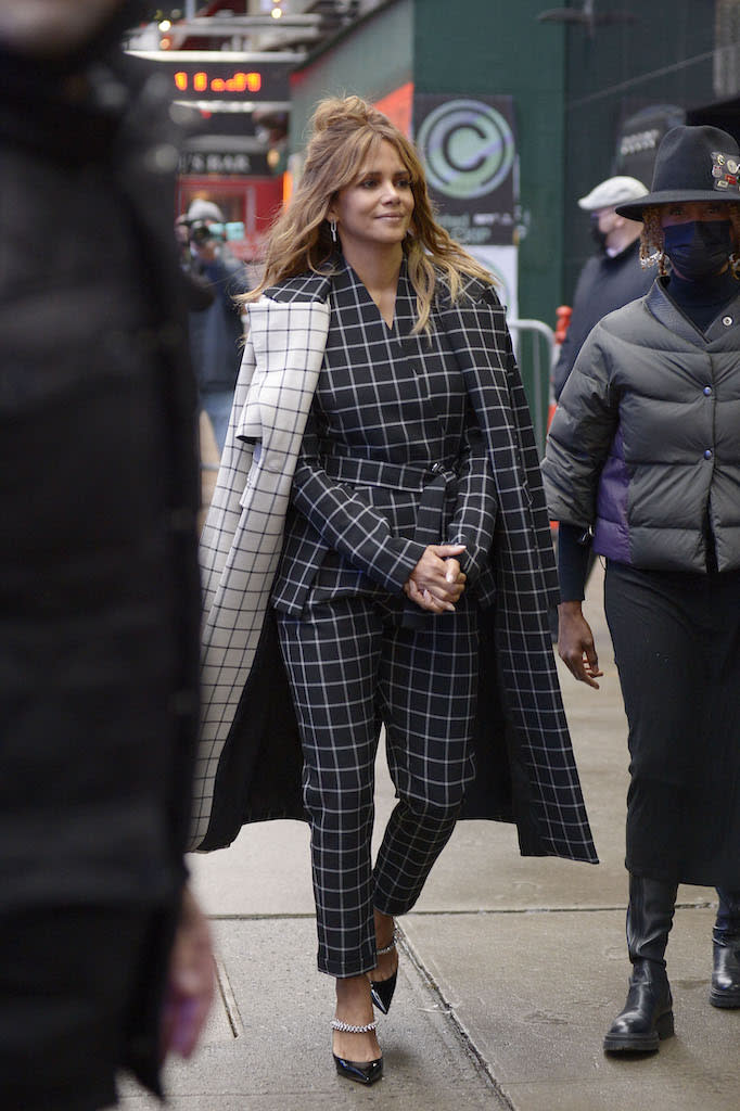 Halle Berry wears a plaid outfit with matching checkered jacket while arriving at “Good Morning America” morning show in New York City on Nov. 22. - Credit: SplashNews.com