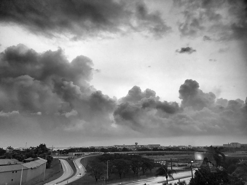 <p>Storm clouds over the Miami International Airport Satuday ahead of the arrival of Hurricane Irma in Miami. (Photo: Holly Bailey/Yahoo News) </p>