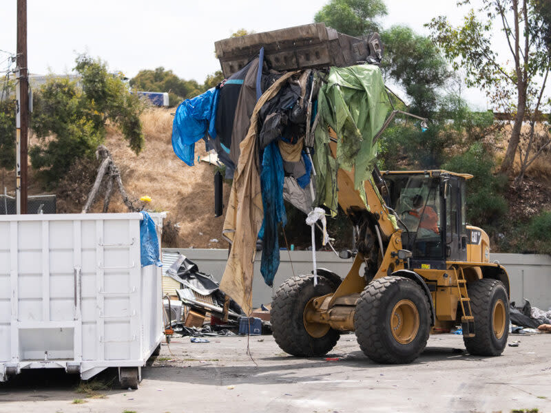 Pathway Home crew members working to remove large amounts of debris from homeless encampments in Los Angeles County. (Pathway Home)