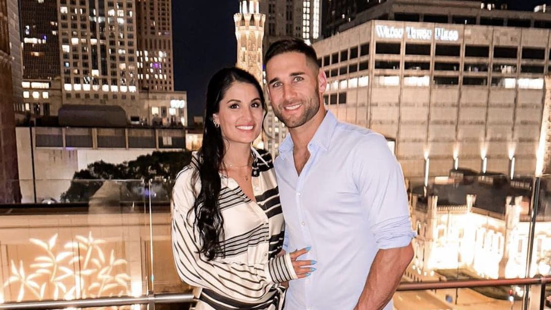 Marisa Moralobo (left) and Kevin Kiermaier pose in front of a skyline. (Photo via @marisamariee on Instagram)