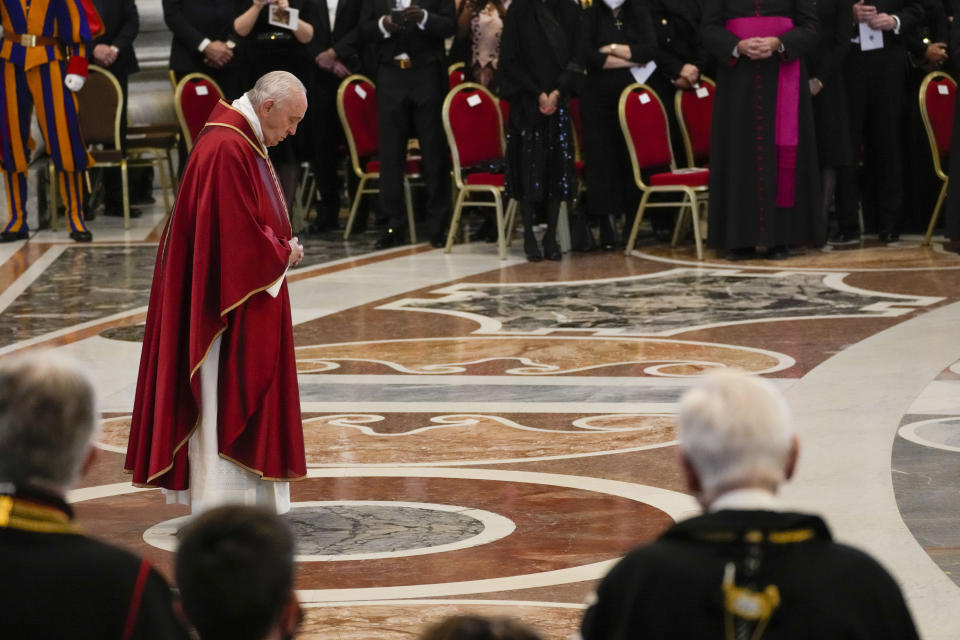 Pope Francis arrives to celebrate the 'In passione Domini' (in the passion of the Lord) mass in St. Peter's Basilica at the Vatican on Good Friday, Friday, April 15, 2022. (AP Photo/Andrew Medichini)