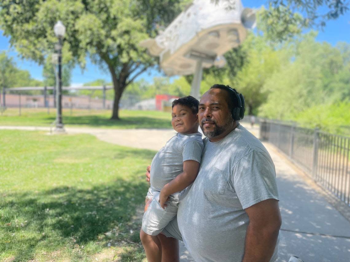 Dwight Young and his son Andrew, 5, want to use the unfinished pool in Sacramento’s Southside Park.