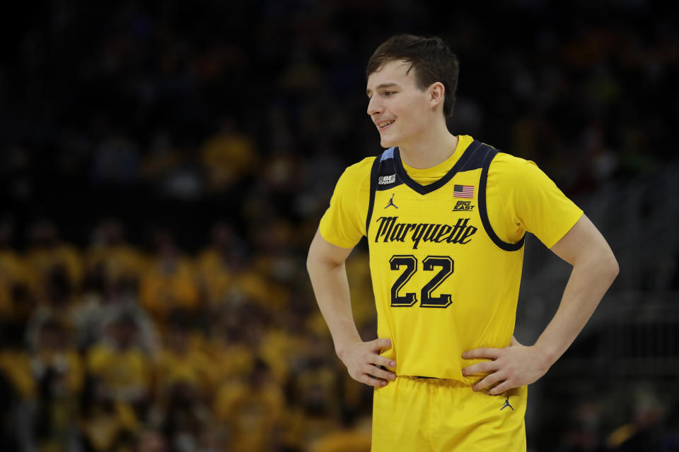 FILE - Marquette's Tyler Kolek smiles during the second half of the team's NCAA college basketball game against Xavier on Jan. 23, 2022, in Milwaukee. Marquette’s two returning starters are defending Big East assists leader Kolek and 6-foot-8 forward Olivier-Maxence Prosper. (AP Photo/Aaron Gash, File)