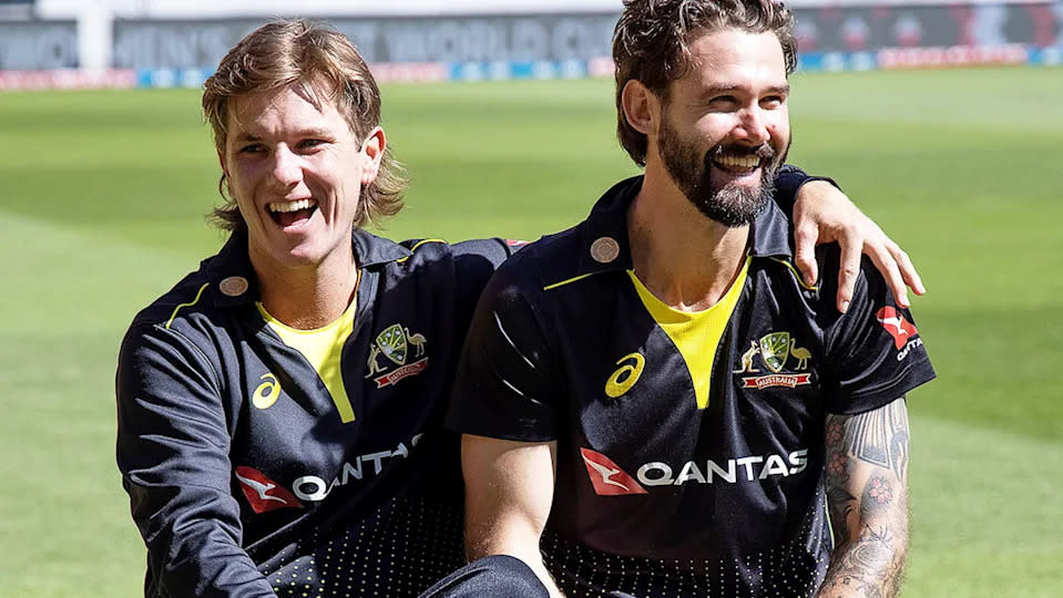 Adam Zampa and Kane Richardson are pictured here posing playfully together.